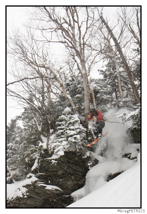 a cliff in the vermont backcountry getting hit by a skier