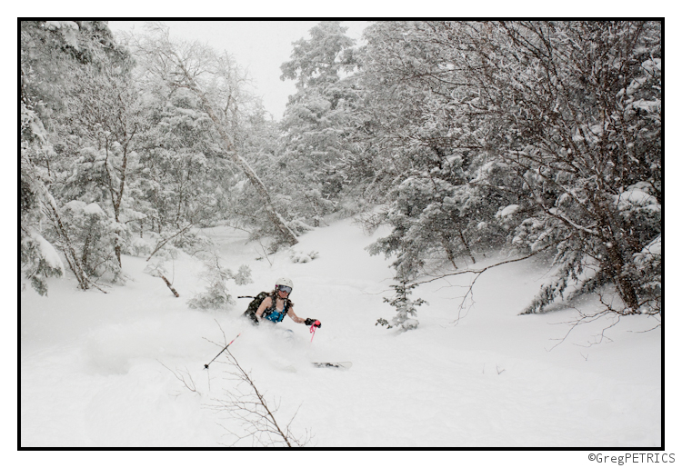 KC skis pow almost naked